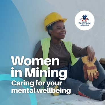 Female mine worker in safety gear highlighting mental wellbeing and resilience for women in mining.
