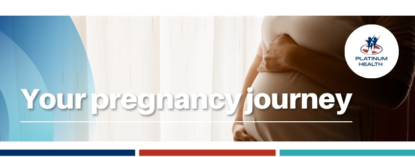 Pregnant woman holding her belly during pregnancy care journey