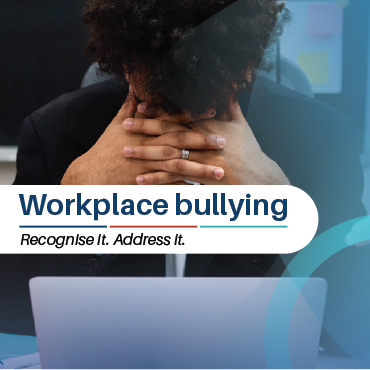 Employee experiencing workplace bullying in an office, promoting awareness and support through Platinum Health Employee Assistance Programme.